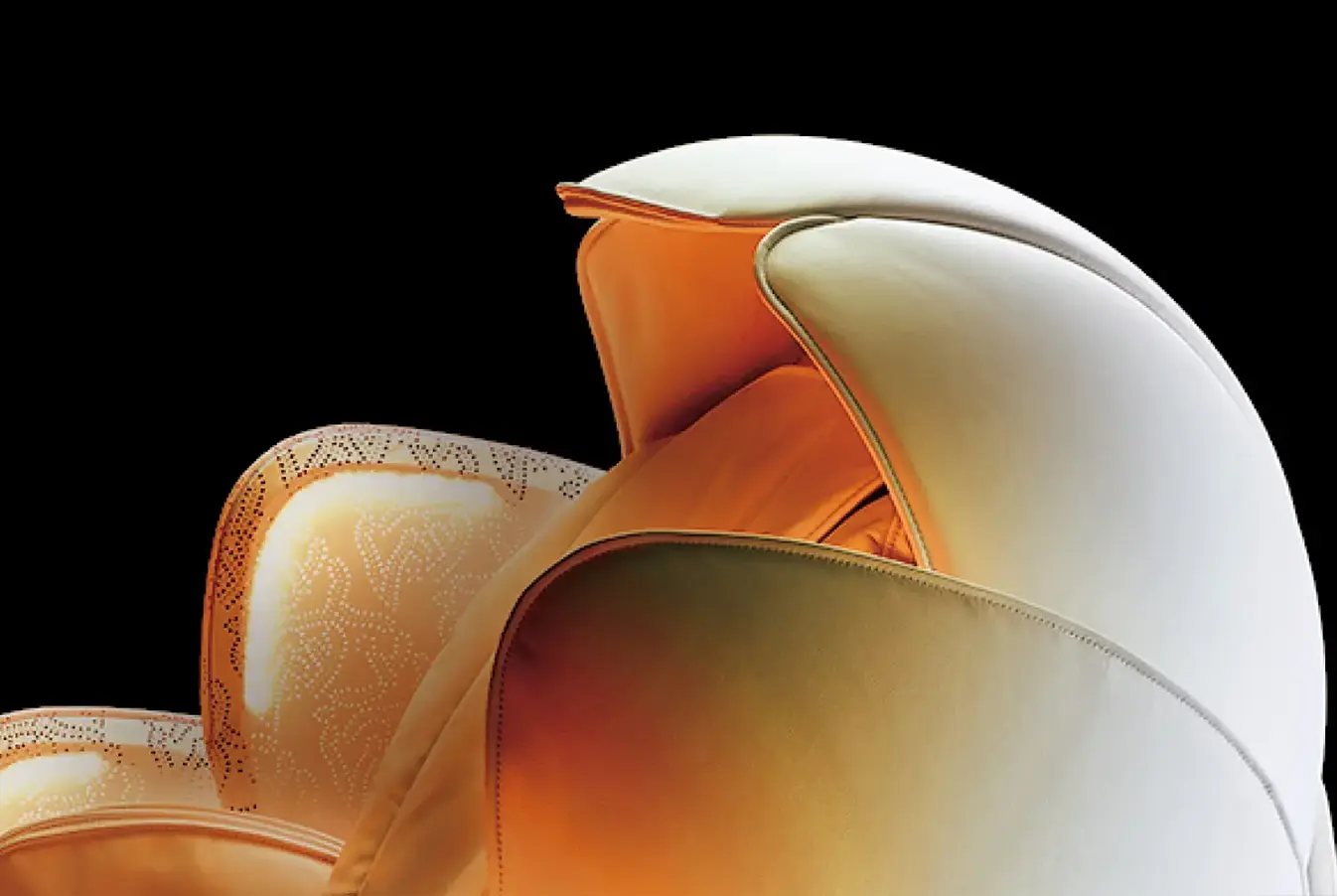 Warm sleep mode lighting on the Inada iCOCOON massage chair creating a calming bedtime atmosphere